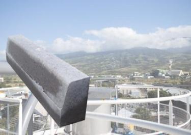 Discharge of big bags of cement for truck loading Discharge of big bags of cement for truck loading