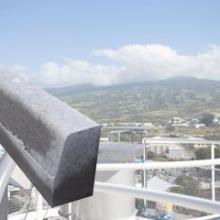 Discharge of big bags of cement for truck loading Discharge of big bags of cement for truck loading