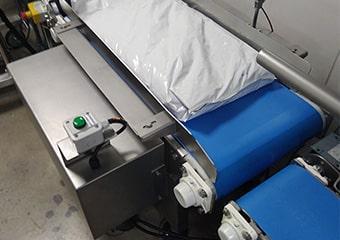 Convoyeur à bande sur conditionneuse de sacs