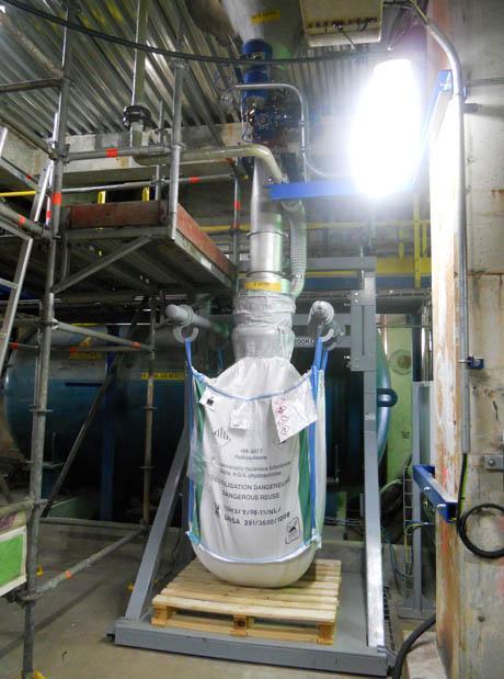 Sistema de llenado de big bag FlowMatic® 02 mediante válvula rotativa para dosificación.
